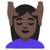 woman getting massage: dark skin tone on Google