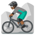 man mountain biking: medium-dark skin tone on Google