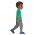 man walking facing right: medium-dark skin tone on Google