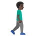 man walking facing right: dark skin tone on Google