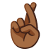 crossed fingers: medium-dark skin tone on Google