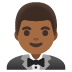 man in tuxedo: medium-dark skin tone on Google
