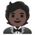 person in tuxedo: dark skin tone on Google