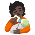 person feeding baby: dark skin tone on Google