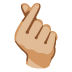hand with index finger and thumb crossed: medium-light skin tone on Google