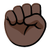 raised fist: dark skin tone on Google