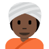 person wearing turban: dark skin tone on Twitter/X