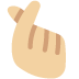 hand with index finger and thumb crossed: medium-light skin tone on Twitter/X