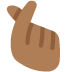 hand with index finger and thumb crossed: medium-dark skin tone on Twitter/X
